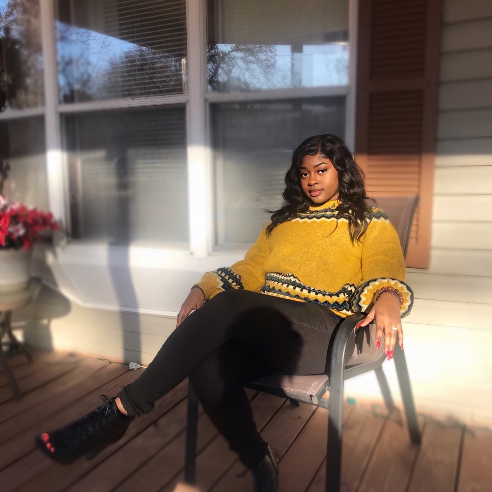 yellow sweater